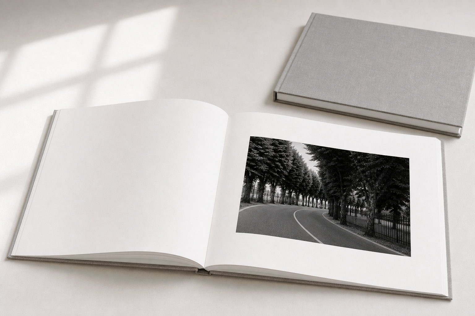 Private photography book with a black-and-white image spread.